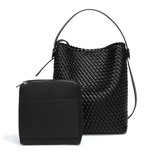 Woven black leather bucket bag with detachable pouch, chic and eco-friendly design, perfect for summer style.