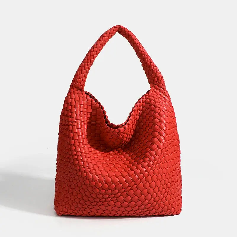 Woven shoulder bag in red, handmade casual tote for women, stylish PU leather design with soft structure.