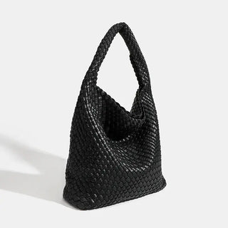 Black woven shoulder bag - Handmade, stylish and practical for everyday use, featuring a soft structure.