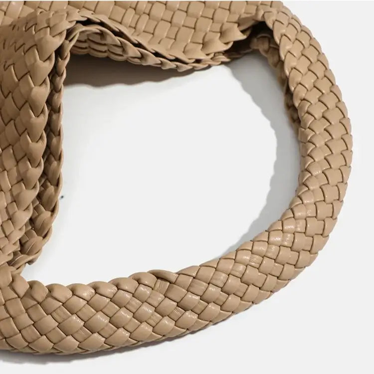 Woven Shoulder Bag - Criss-Cross Design close-up of the braided strap in soft beige PU leather.