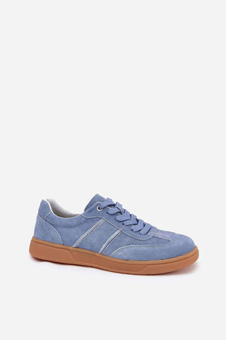 Sport shoes in light blue suede, low women's sneakers with classic lacing for comfort and style.