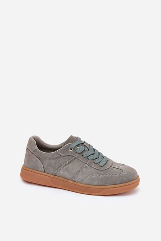 Low women's sneakers in grey suede with classic lacing and a comfortable leather insole, perfect for versatile styles.