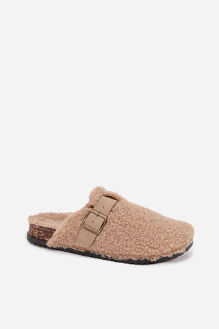 Women's sheepskin-style slippers in soft beige with adjustable buckle for comfort and style.