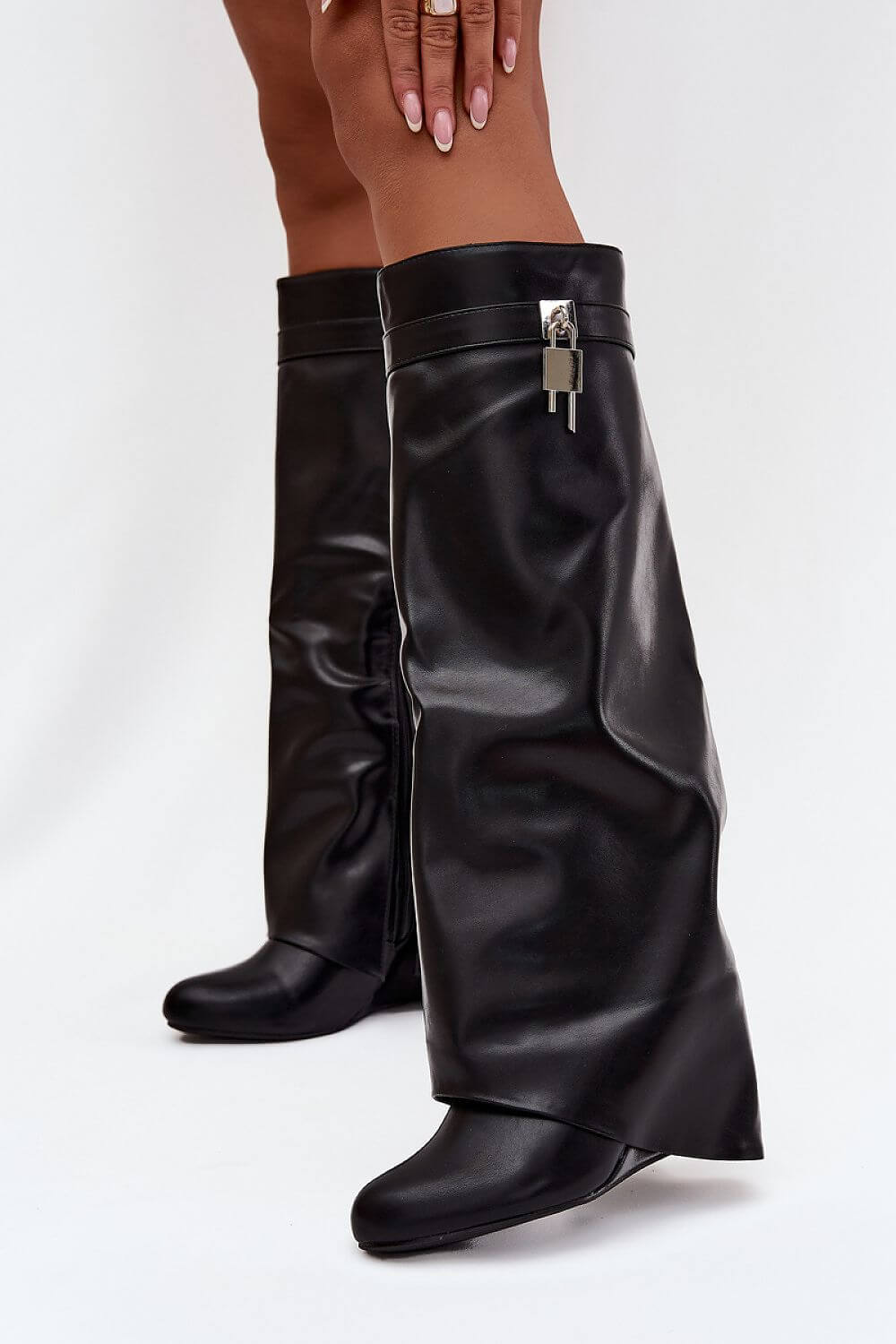 Stylish Women's boots made of eco leather suede with wedge heel and unique turned-over upper detail.