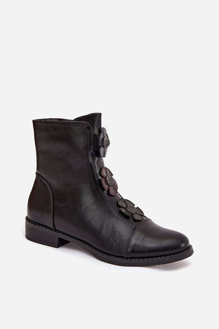 Women's boots by Jezzi in black eco leather with decorative flowers and flat heel for comfort.