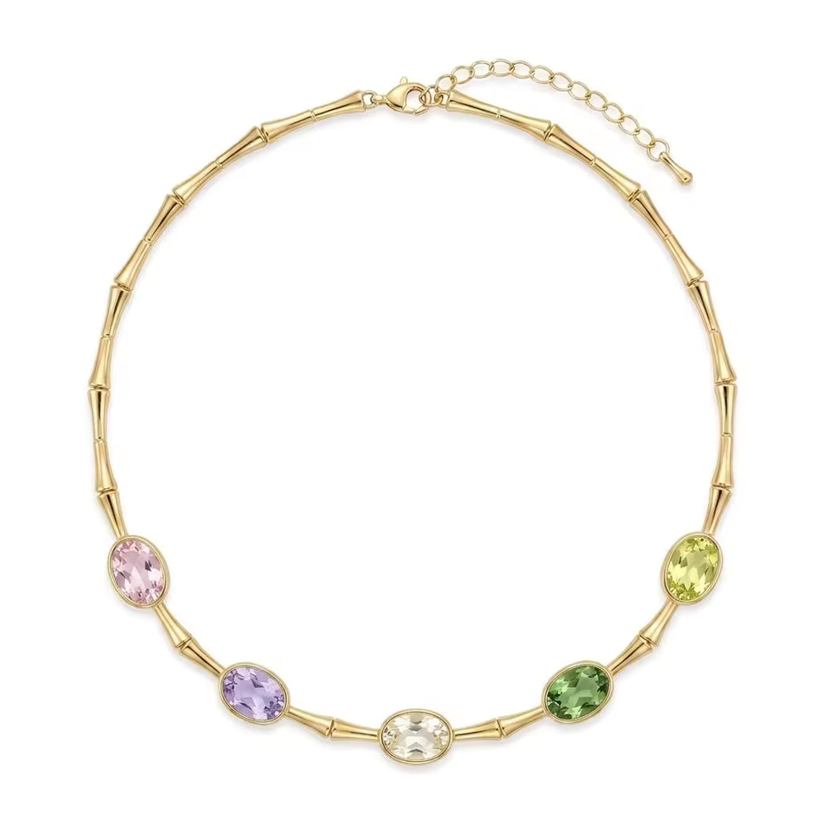 Collana in bamboo dorato con cristalli ovali