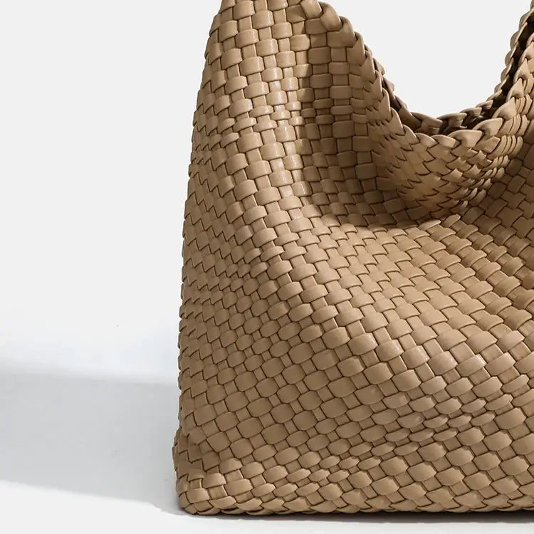 Woven Shoulder Bag - Criss-Cross Design featuring a stylish woven texture and soft structure.