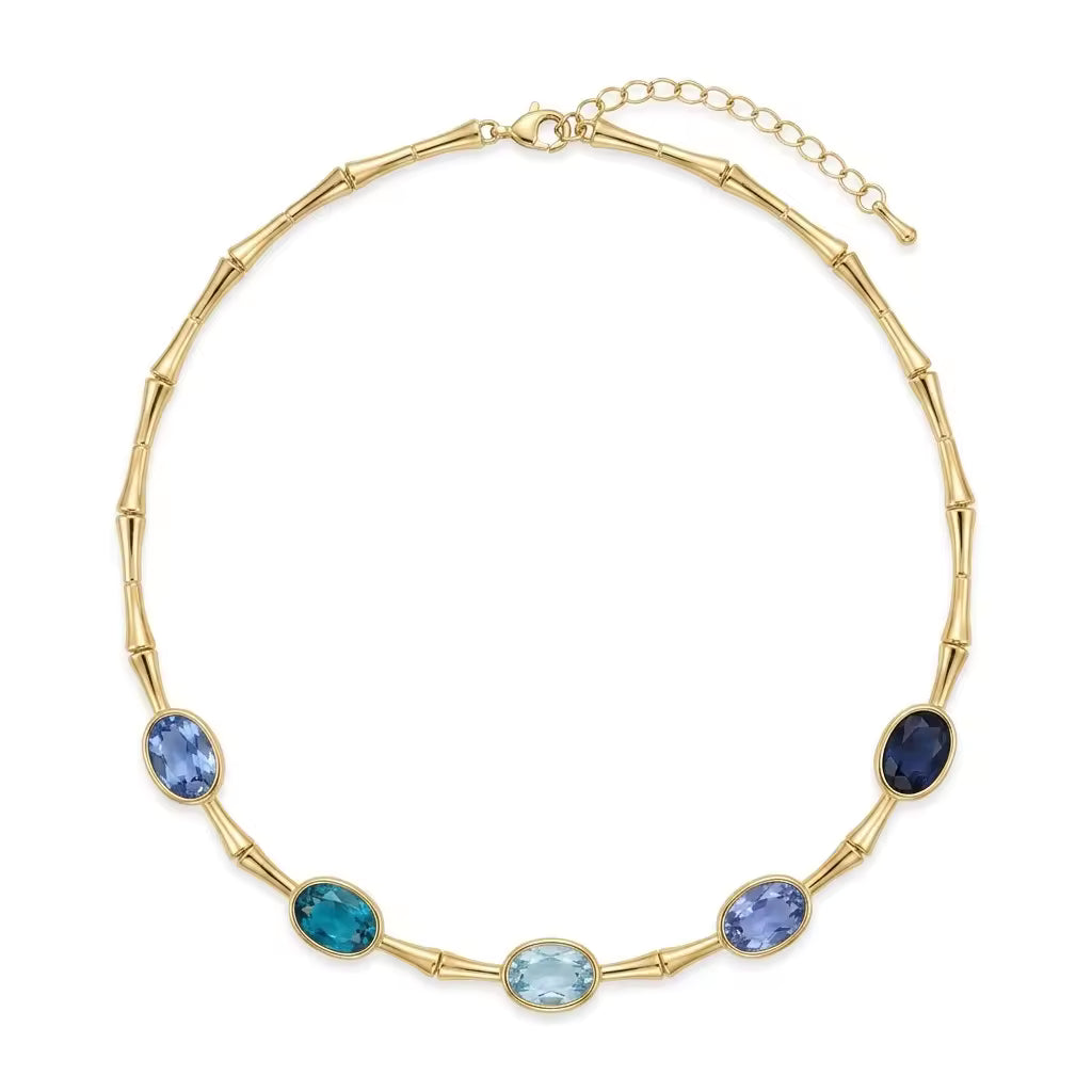 Collana in bamboo dorato con cristalli ovali