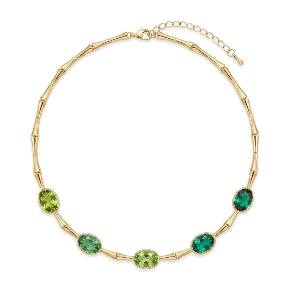 Collana in bamboo dorato con cristalli ovali