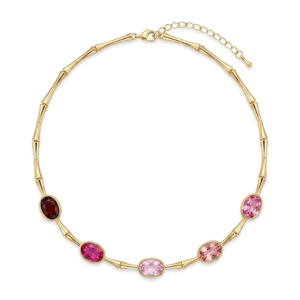 Collana in bamboo dorato con cristalli ovali