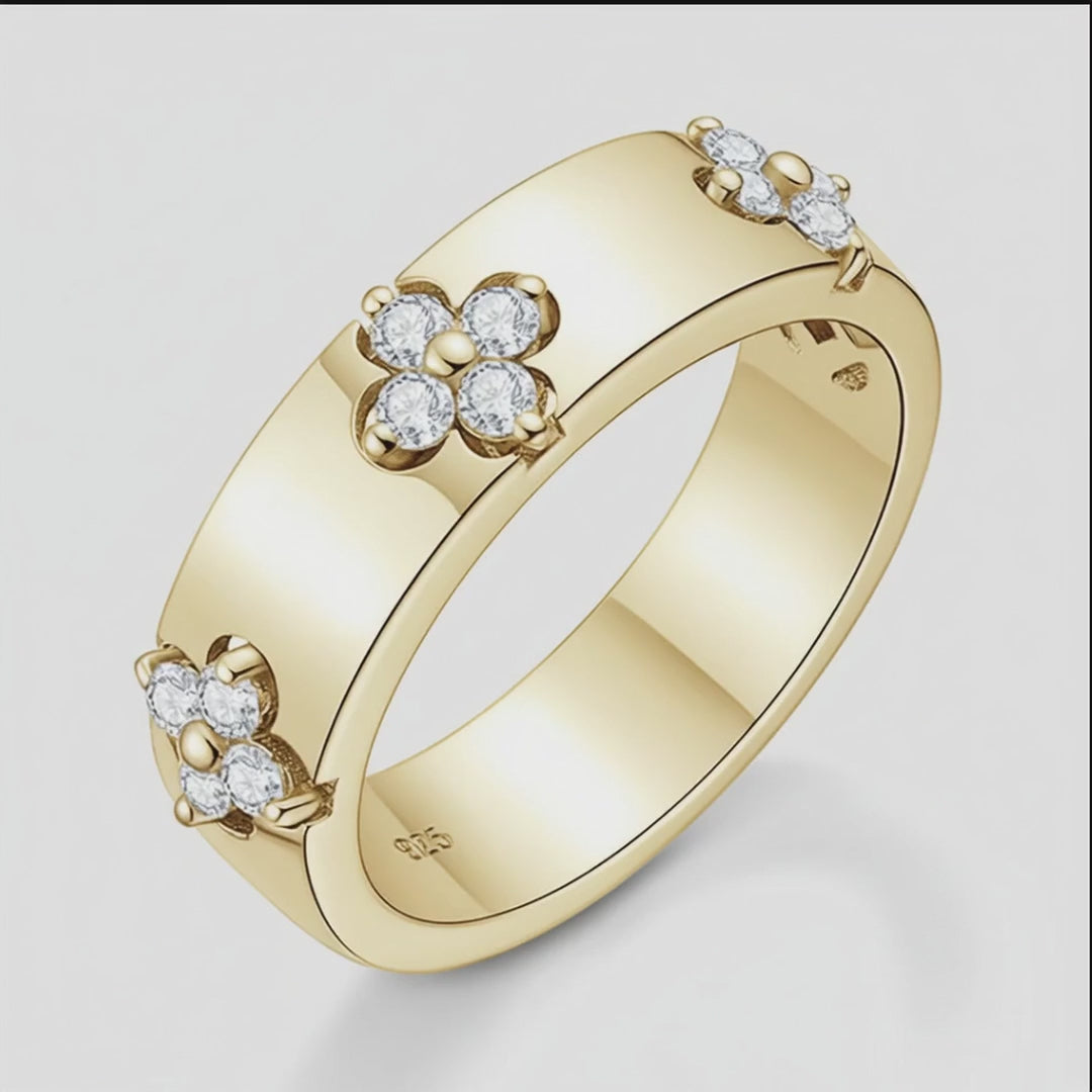 Moissanite Ring – 925 Sterling Silver with flower design and sparkling stones, crafted in 18K Gold.