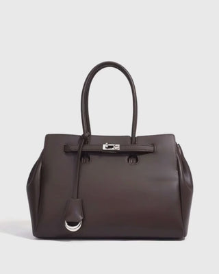 Womens Leather Tote Bag in dark brown with silver lock detail for elegant and durable everyday use.