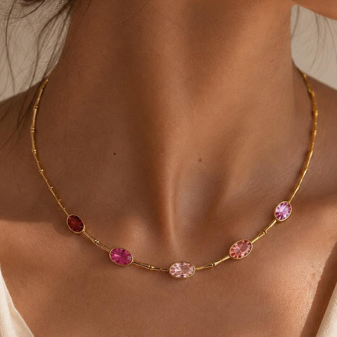 Collana in bamboo dorato con cristalli ovali