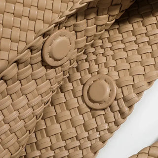 Woven Shoulder Bag - Criss-Cross Design close-up showing woven texture and button details.